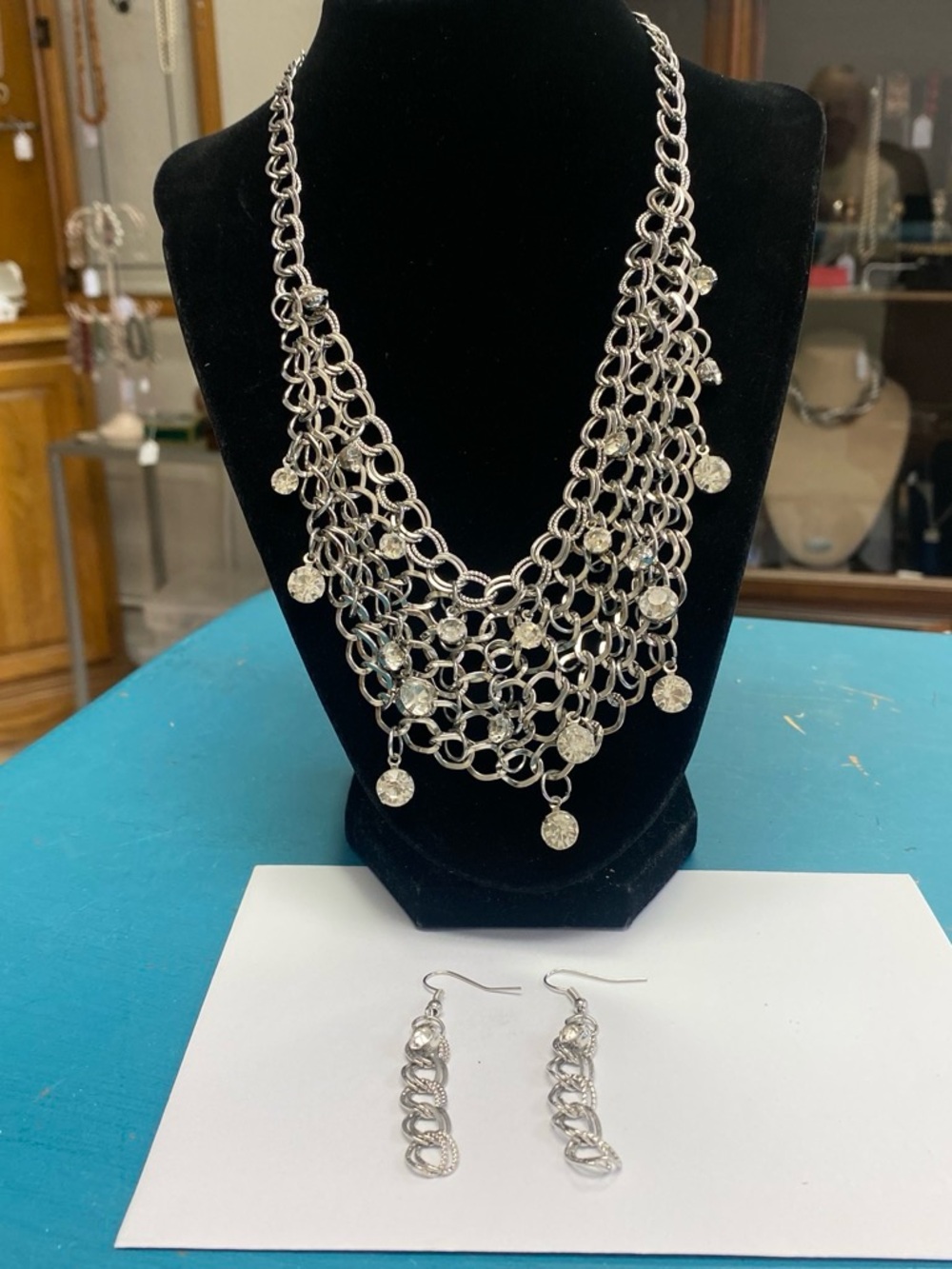 Silver Multi-Row Chain Statement Necklace with Dangle Crystals and Earrings